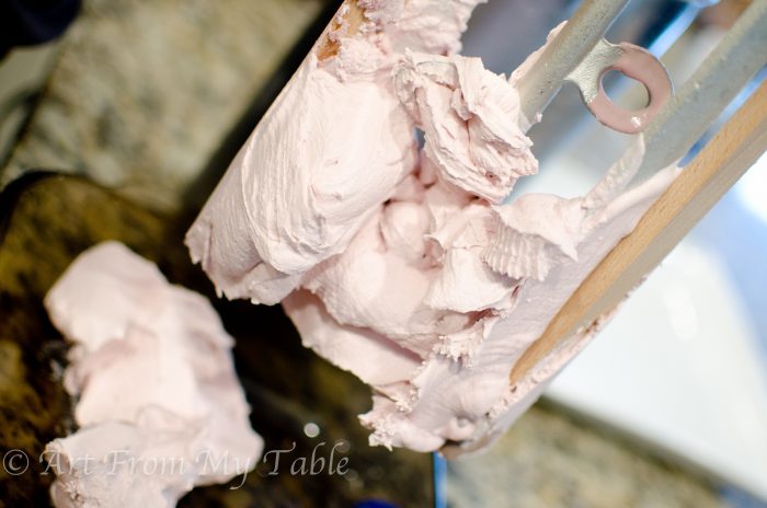 Pomegranate ice cream on the "blades" of the ice cream maker.