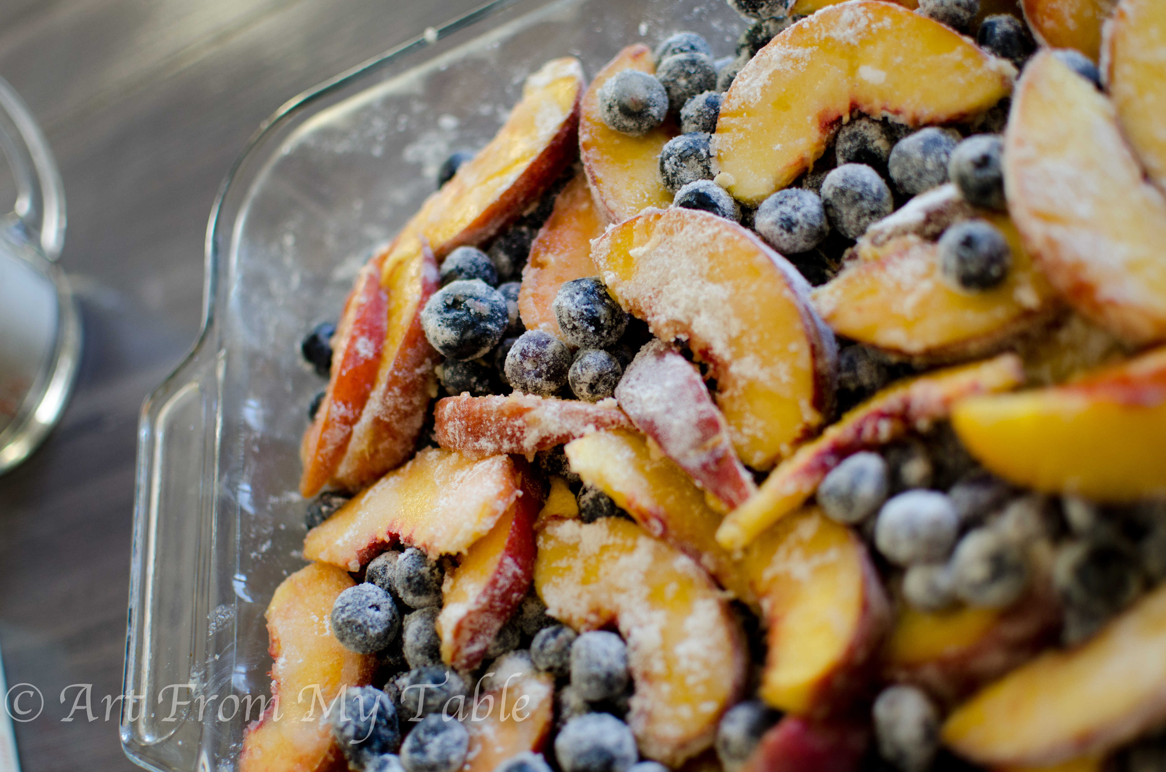 Filling for blueberry peach crisp mixed together.