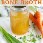 mason jar filled with chicken bone broth made in the instant pot