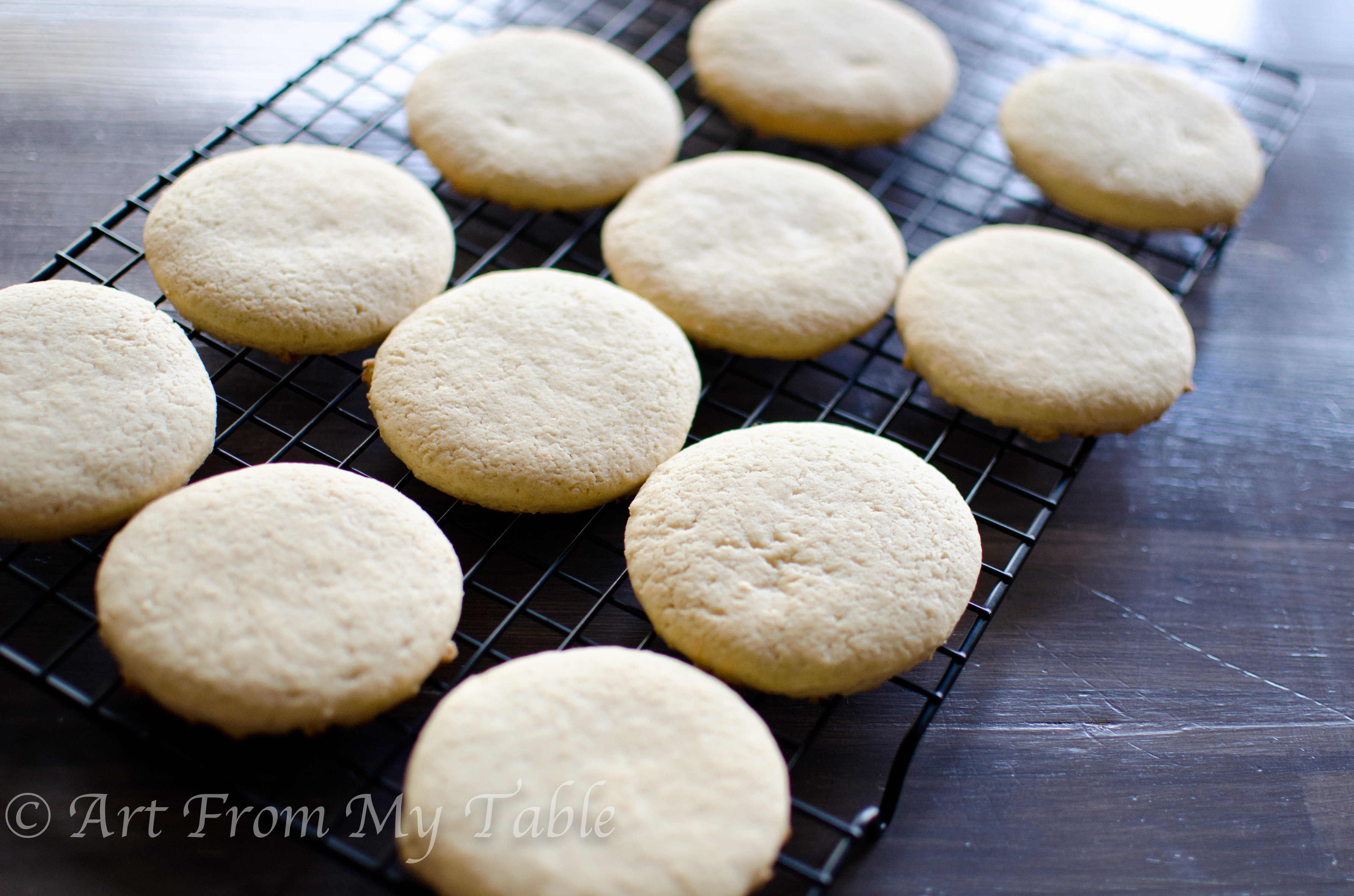 Coconut sugar cookies on a cooling rack.