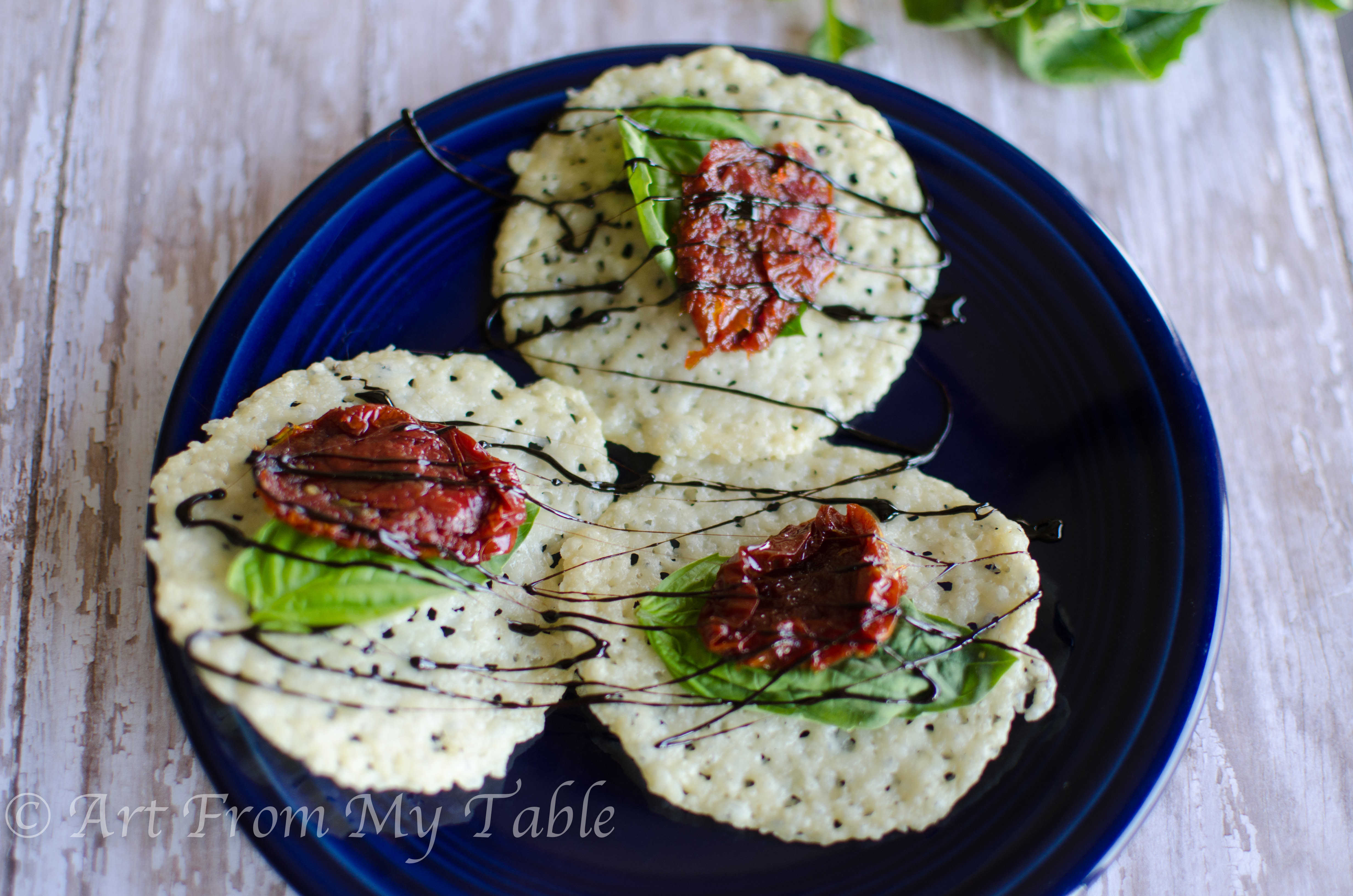 plate of Parmesan cheese crisps on a plate.