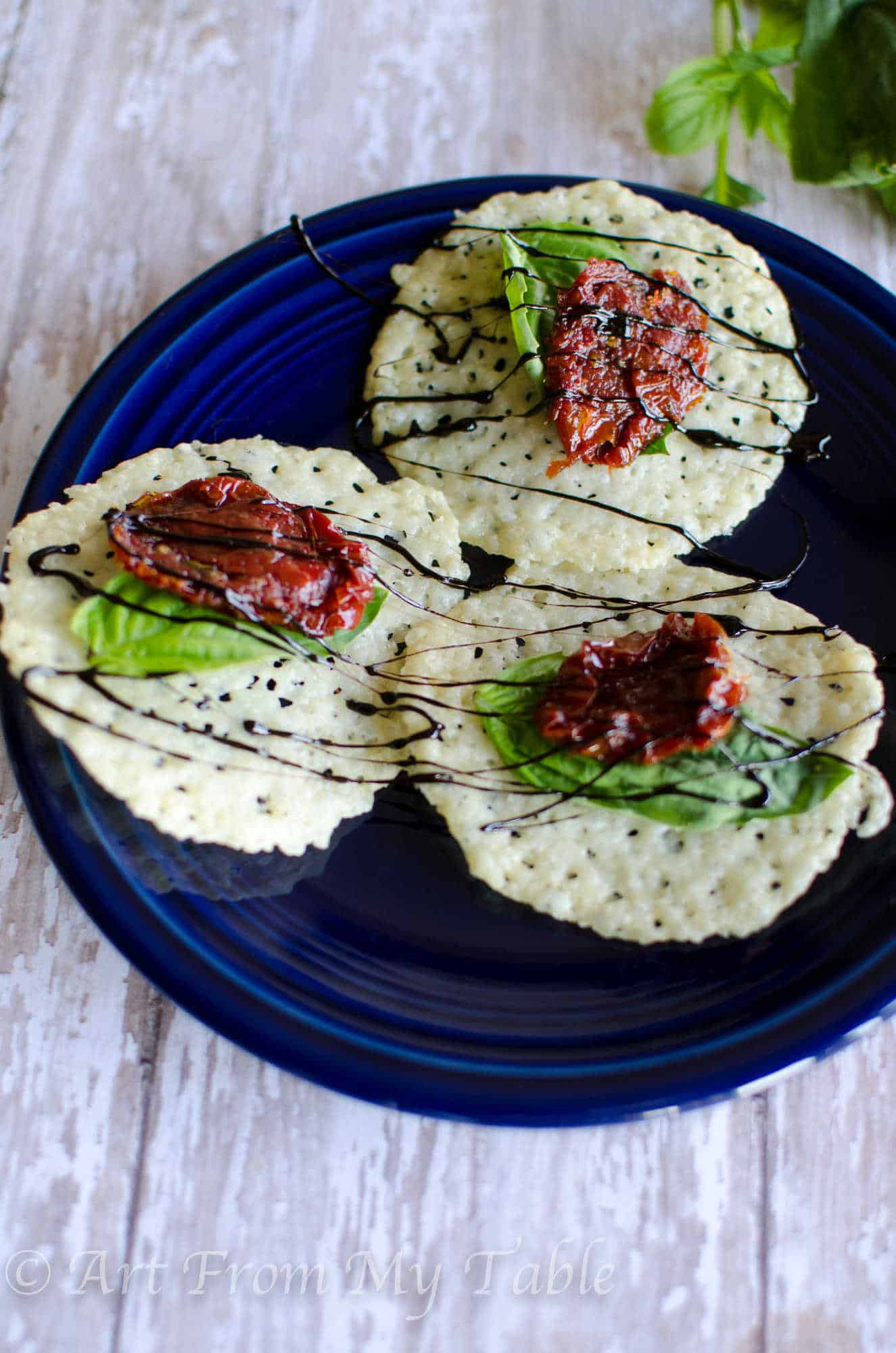 Parmesan Crisps {with Basil and Sun Dried Tomatoes}