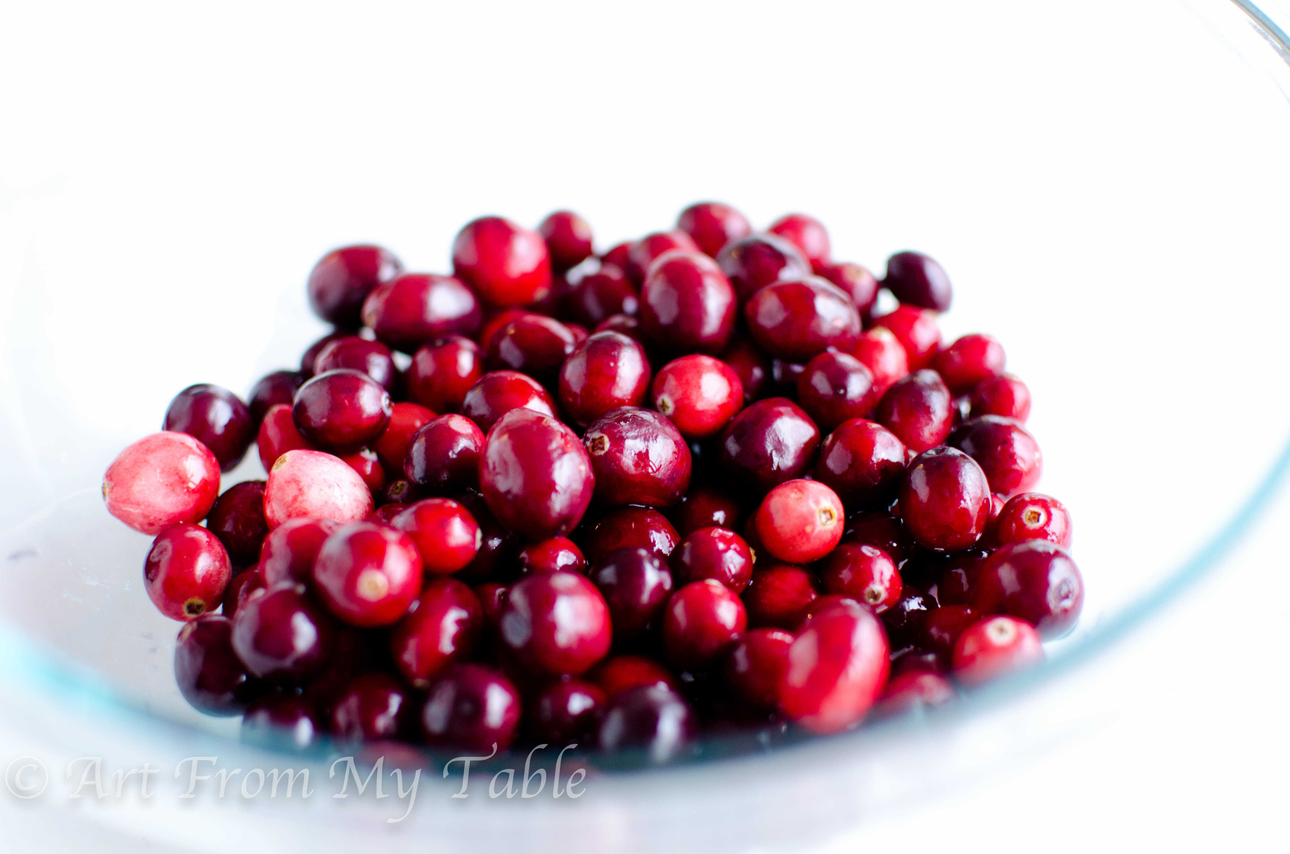 Bowl of fresh cranberries.