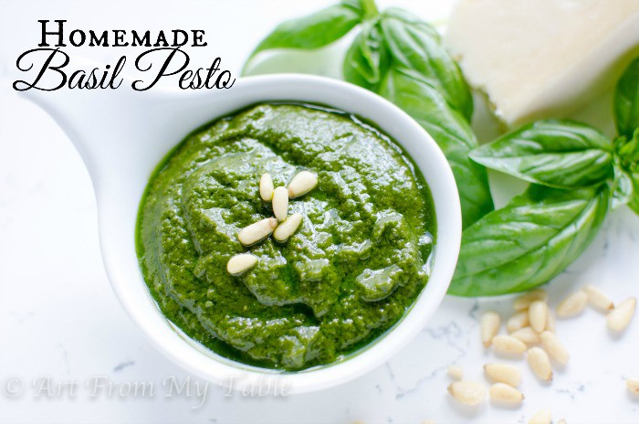 From scratch basil pesto in a white serving dish.