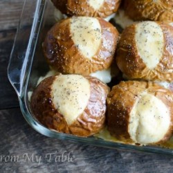 pan of baked ham and cheese soft pretzel sliders