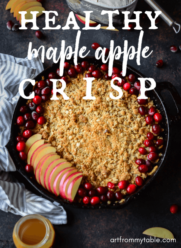Looking for the perfect fall recipe? This Healthy Apple Crisp is above the rest and extra delicious with the addition of cider soaked cranberries, pure maple syrup, and toasted walnuts. This easy recipe will impress. You'll never know it's a healthier option. #artfrommytable #apples #applecrisp #healthyapplerecipe #healthyapplecrisp #dessert #betterforyou #healthier #fallfood #applerecipe via @artfrommytable