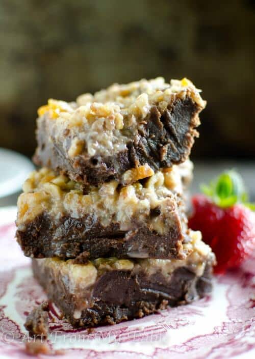 Stack of 3 of the famous Palmer House brownies, fudgey with a nut topping.