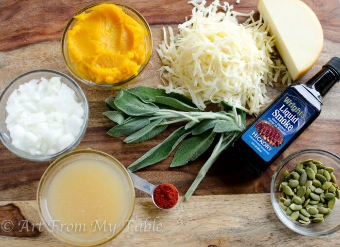 Ingredients for smoky pumpkin soup: Broth, onion, pumpkin puree, smoked gouda cheese, liquid smoke, paprika and sage.