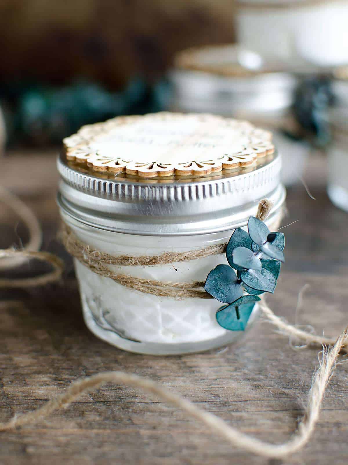 small jam jar tied with twine, filled with homemade eucalyptus body butter. 