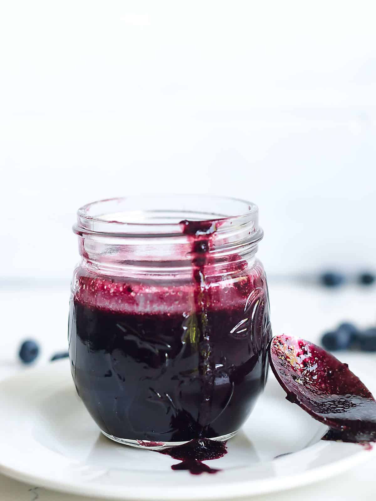 blueberry balsamic dressing in a glass jar.