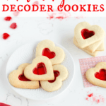 Valentines Day Sugar cookies that reveal messages, heart shaped cookies with a red 'stained glass' window to read a message.