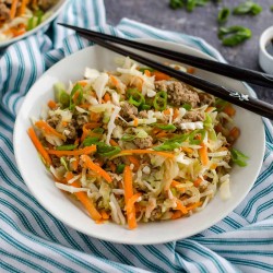 white bowl filled with a deconstructed egg roll, a.k.a. "egg roll in a bowl", a healthy version of an egg roll without the wrapper