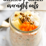 jar of carrot cake overnight oats topped with grated carrots, pineapple, coconut and pecans