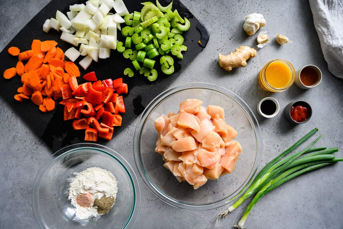chopped up ingredients for crockpot orange chicken