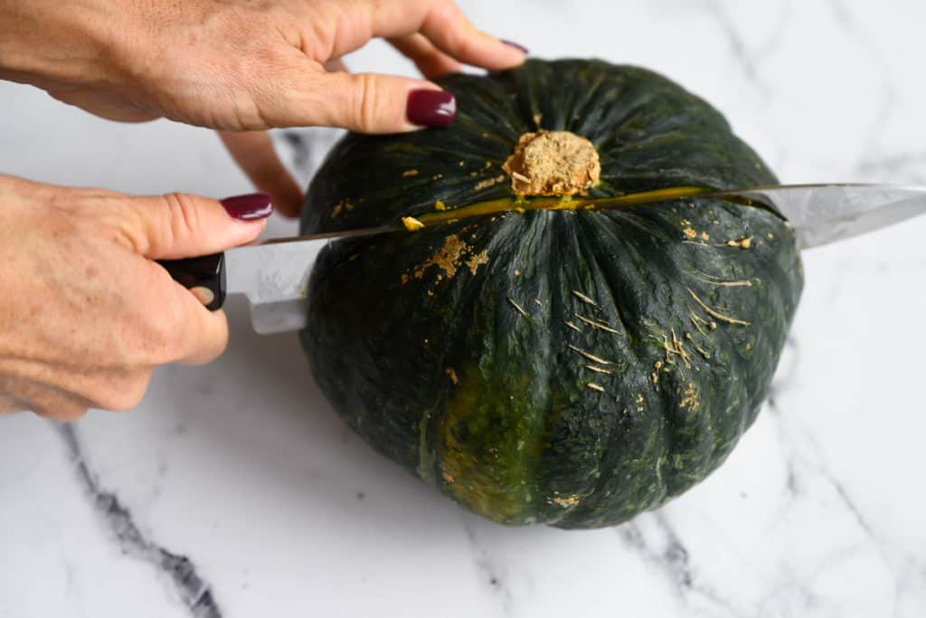 buttercup squash being cut in half