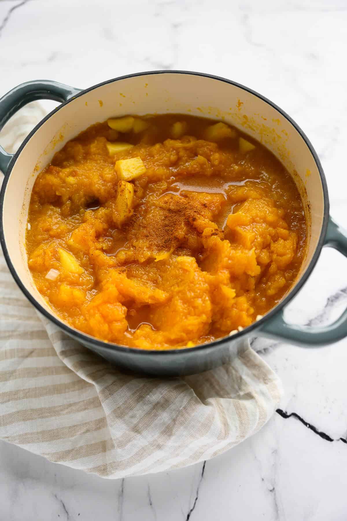 pot of roasted butternut squash and apple chunks