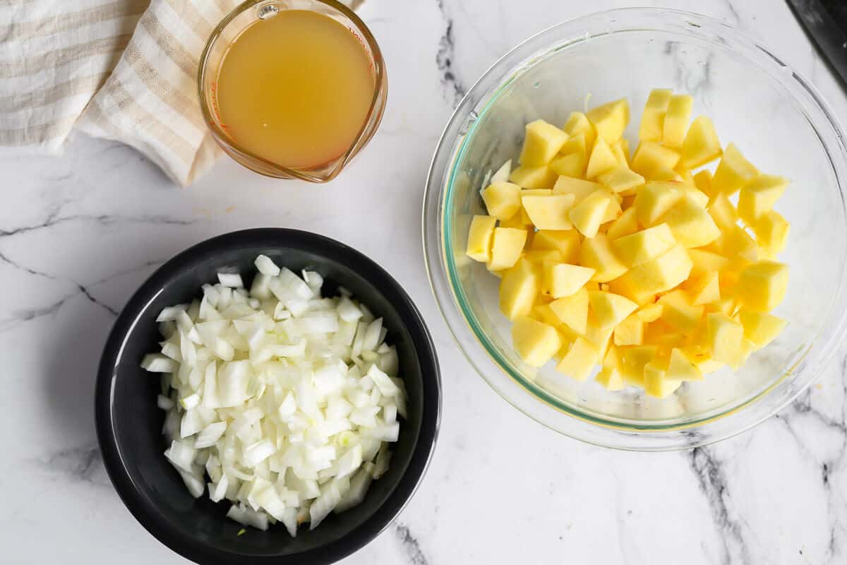 diced onions, diced apples, and chicken broth