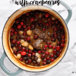 Braised Beef with cranberries and pearl onions in a dutch oven