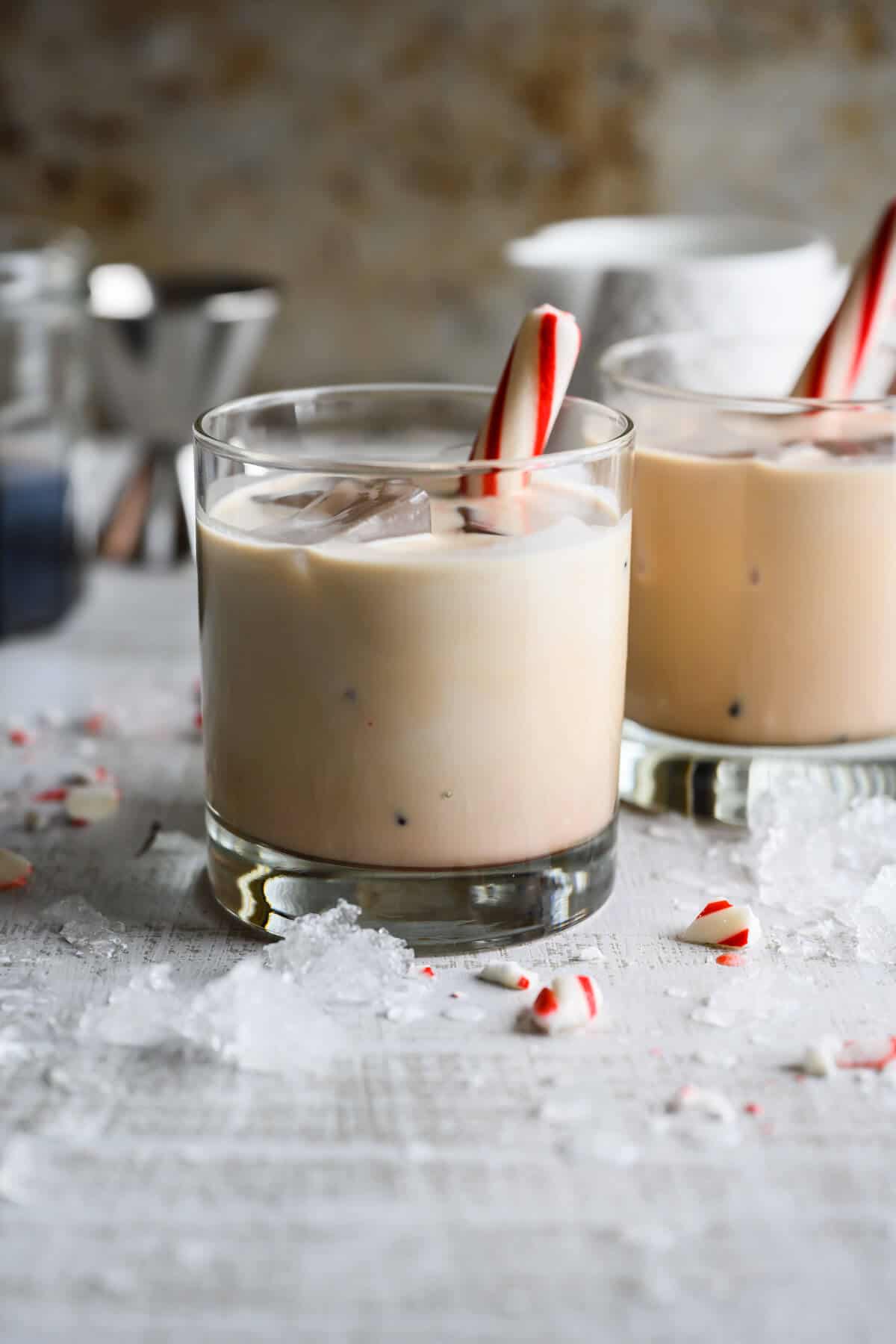 non alcoholic peppermint white russian garnished with peppermint stick