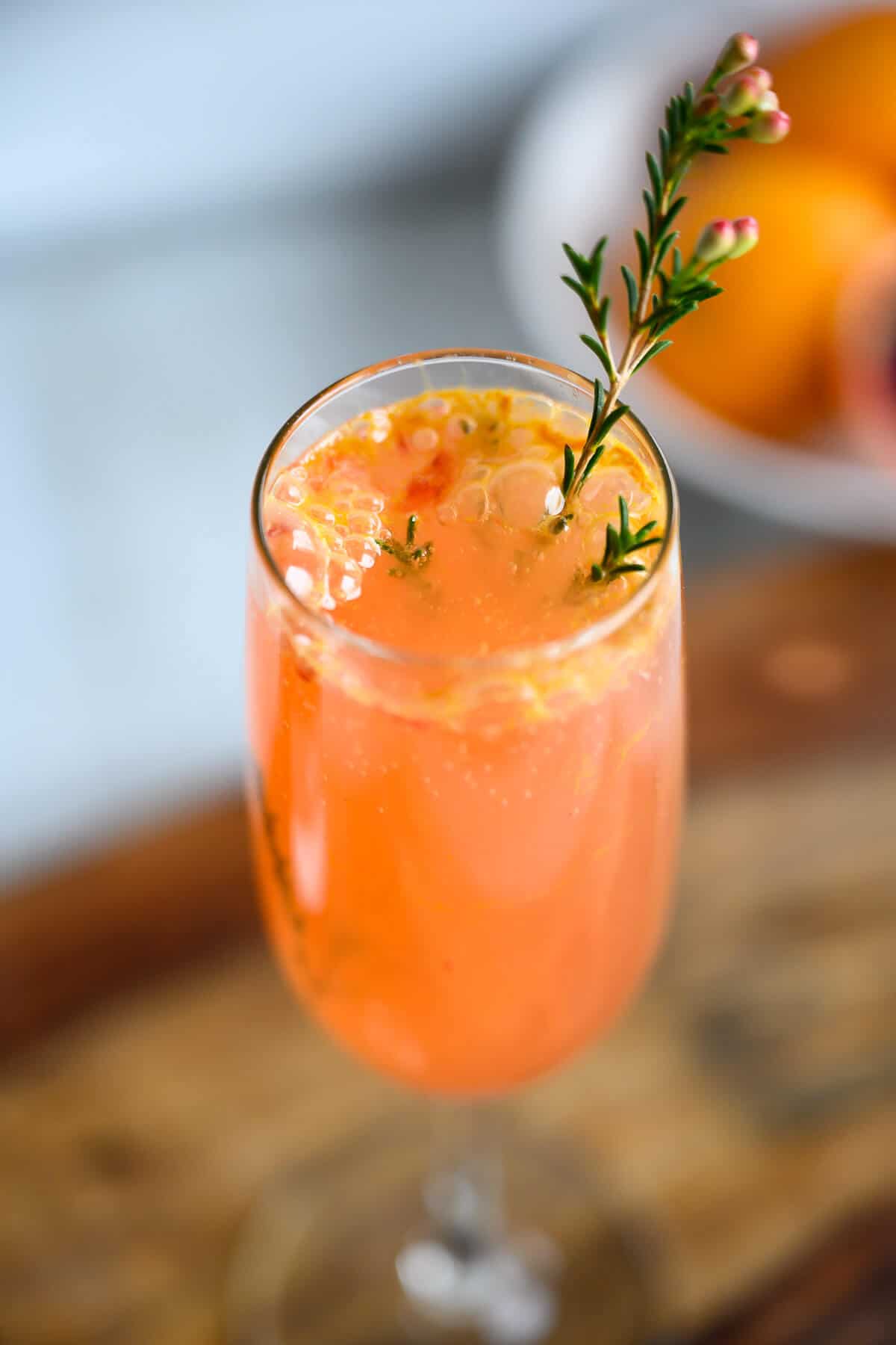 blood orange nonalcoholic mimosa in a champagne flute