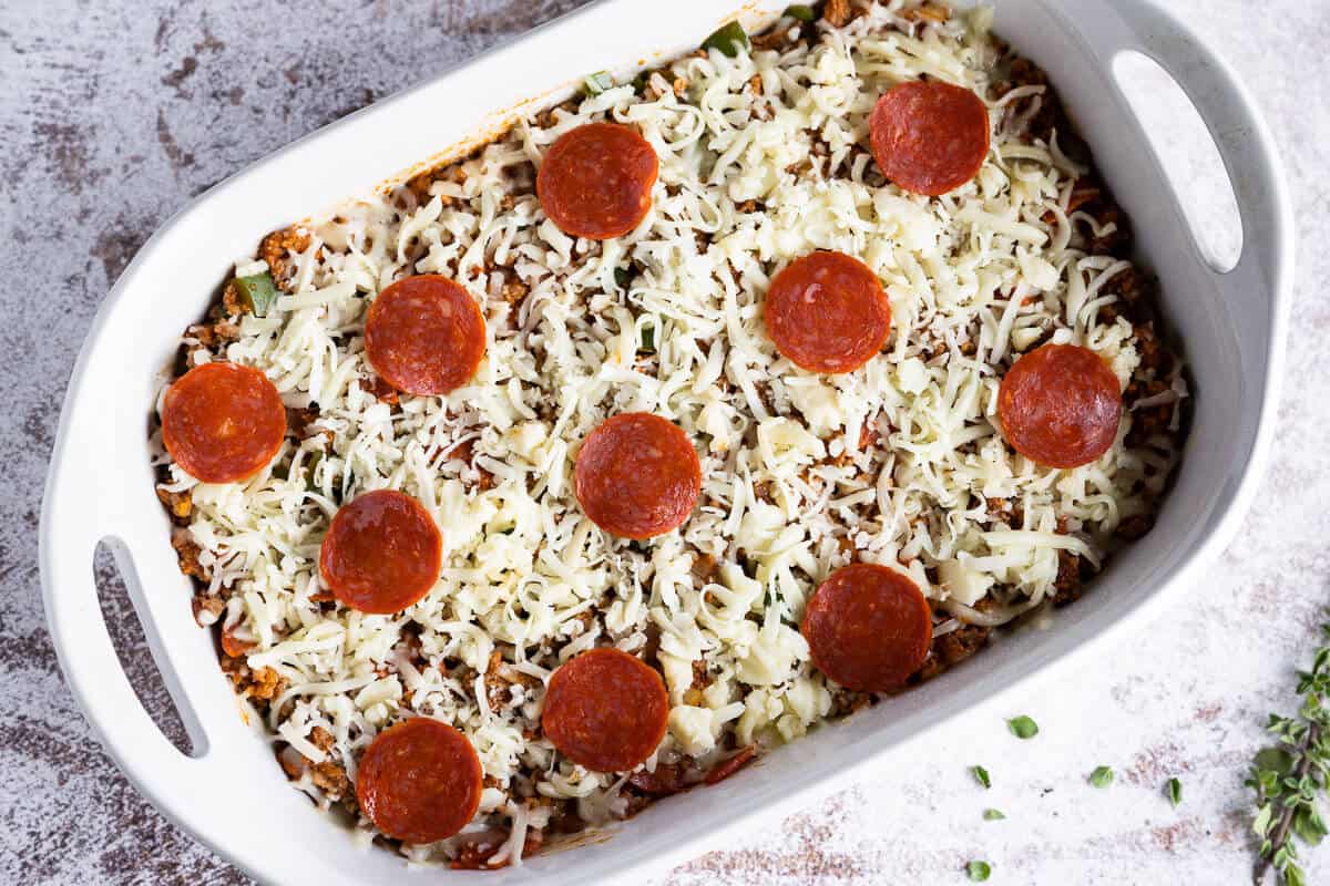 assembled pizza casserole before baking
