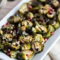 platter of roasted brussels sprouts drizzled with balsamic reduction