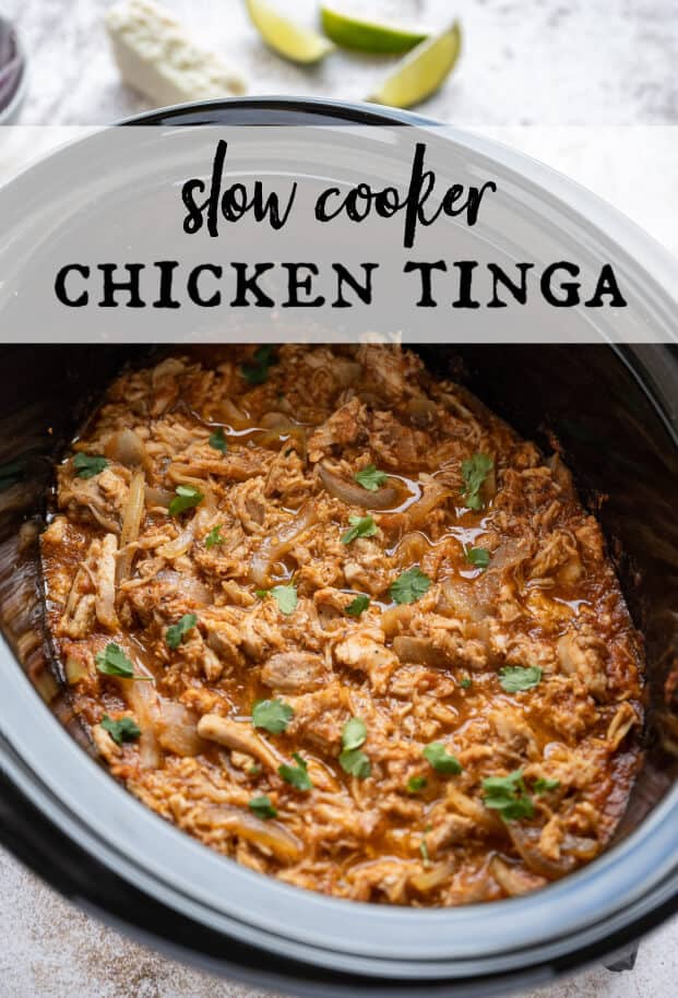 Chicken Tinga makes the most delicious shredded chicken tacos! Flavorful, tender, juicy and smoky! Cooking them is a breeze in your slow cooker. Also works perfectly for Enchiladas, Burritos, Tostadas, Nachos, and all your favorite Mexican Inspired dishes! #chickentinga #slowcooker #crockpot via @artfrommytable