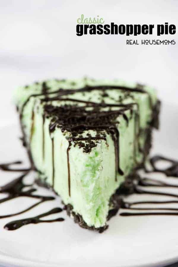 grasshopper pie drizzled with chocolate syrup on a white plate