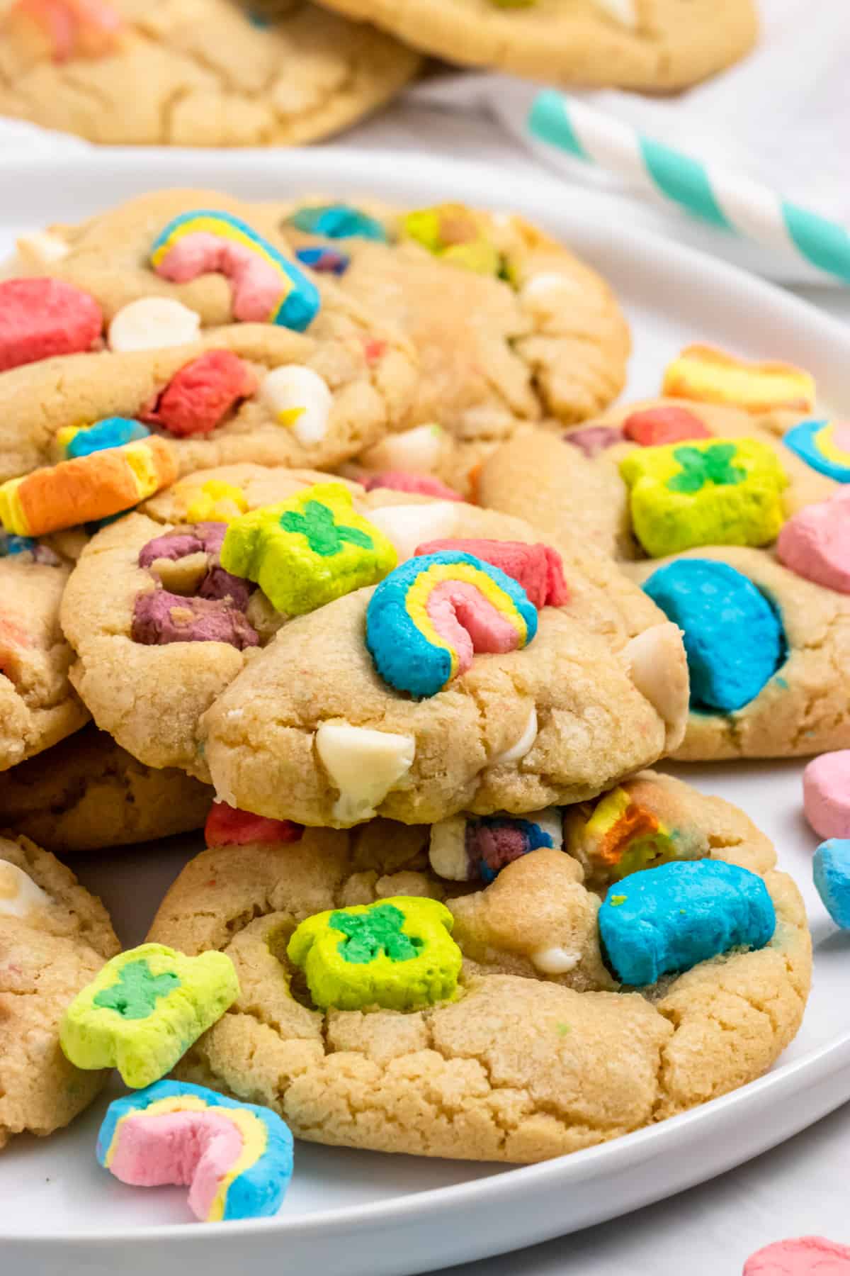 a round plate full of cookies made with Lucky Charms cereal