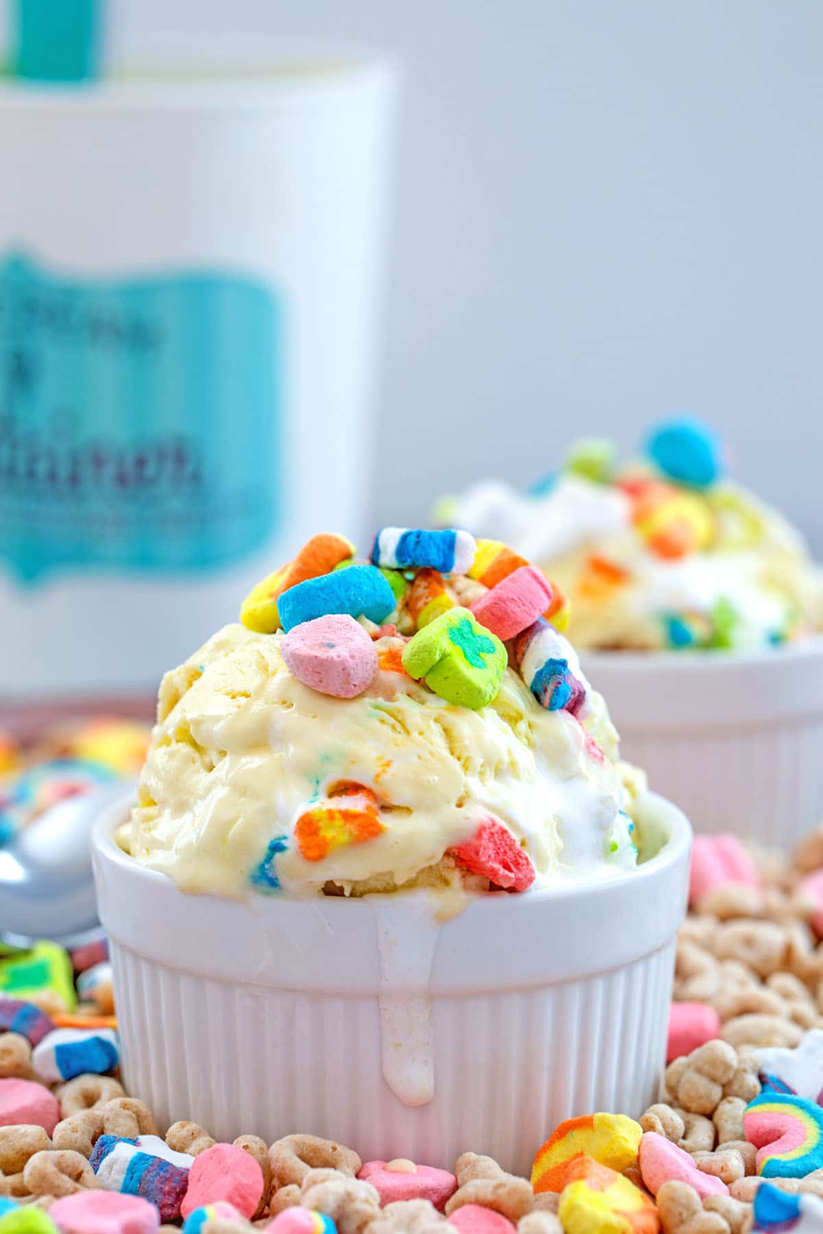 ramekin filled with lucky charms ice cream, topped with lucky charms marshmallows
