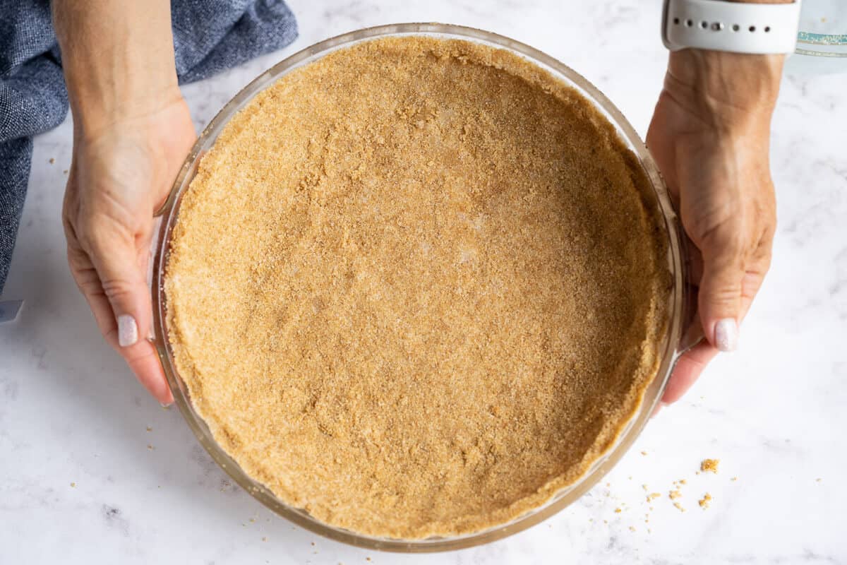 baked graham cracker crust in a pie plate