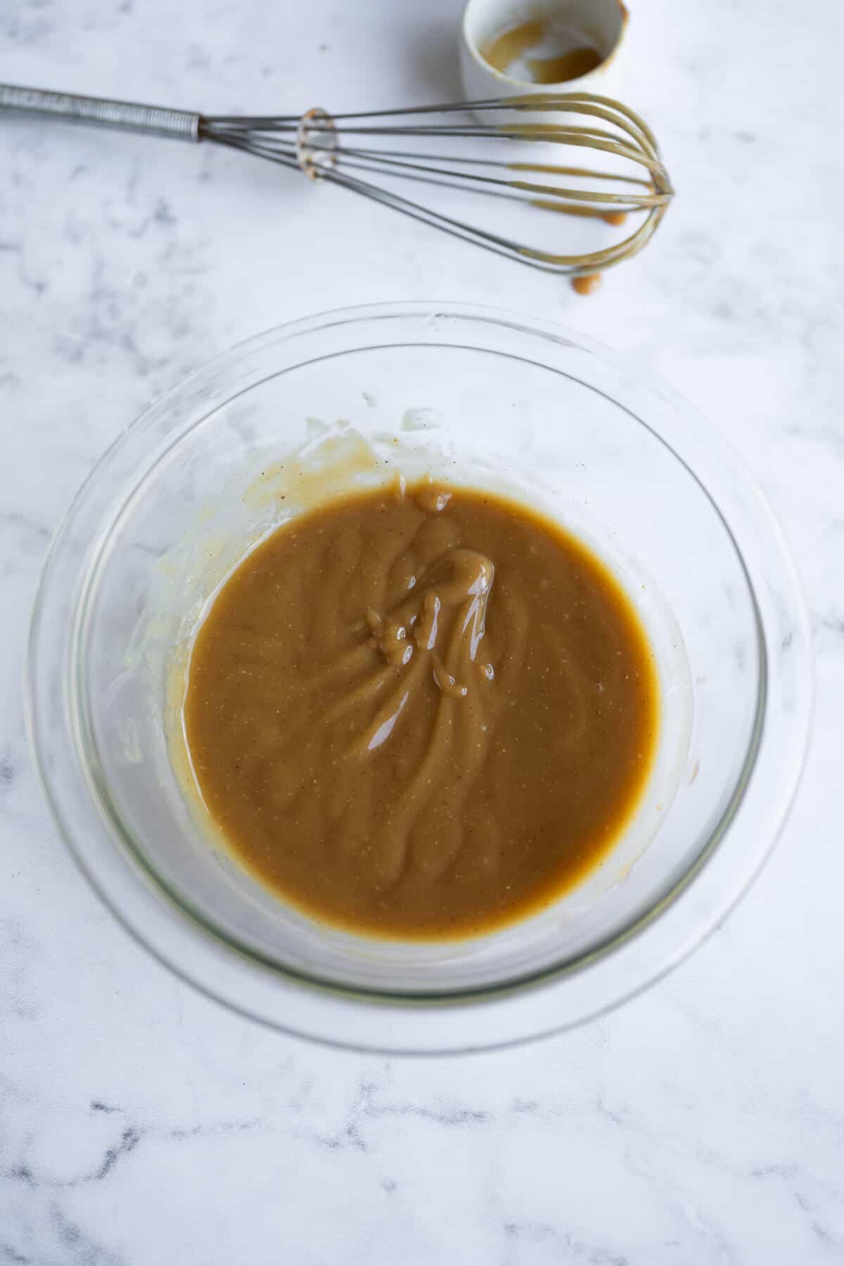 bowl of asian type sauce just mixed together.