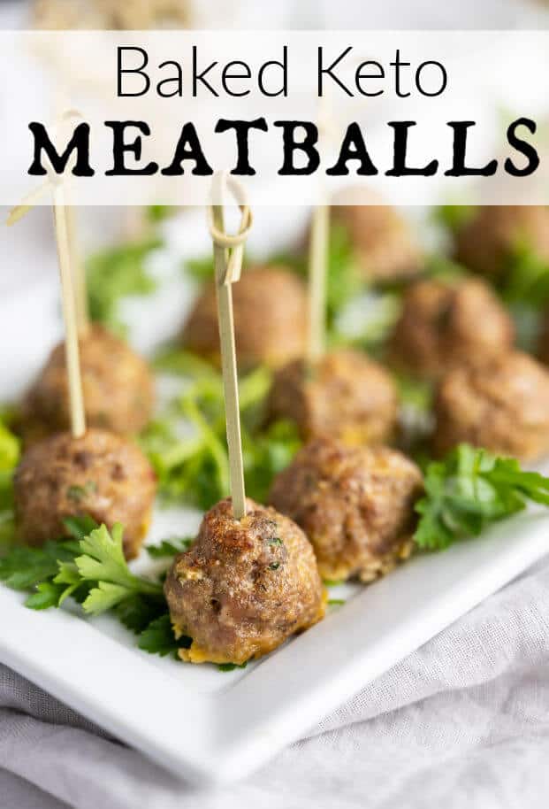 Italian style meatballs without sauce served on a white platter with toothpicks in them. via @artfrommytable