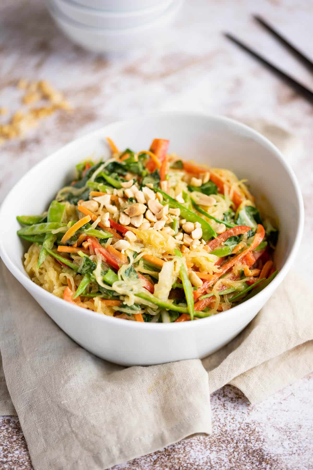 bowl of asian style spaghetti squash and Asian veggies