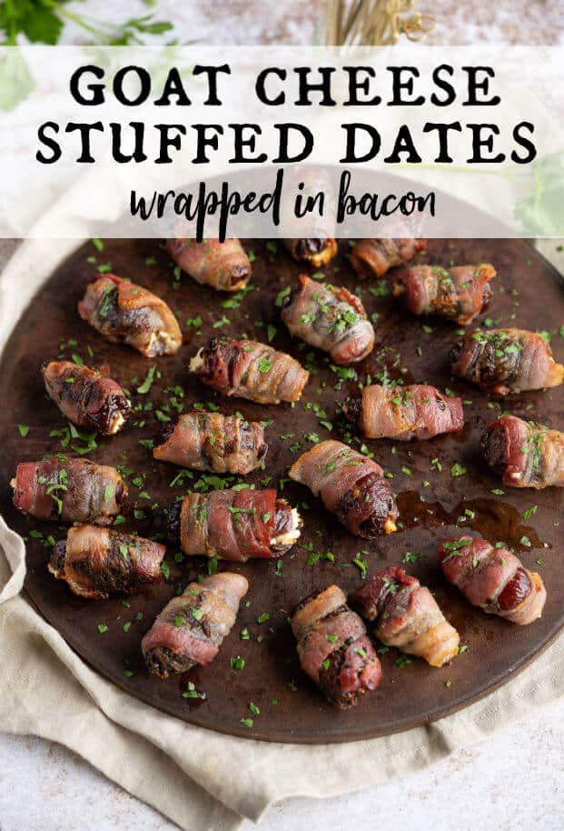Goat cheese stuffed dates, wrapped in bacon, on a round serving platter. via @artfrommytable