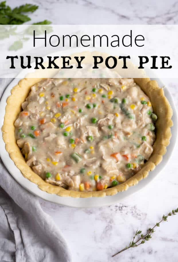 Turkey Pot Pie filling in a pie crust, not yet covered with the second pie crust. via @artfrommytable