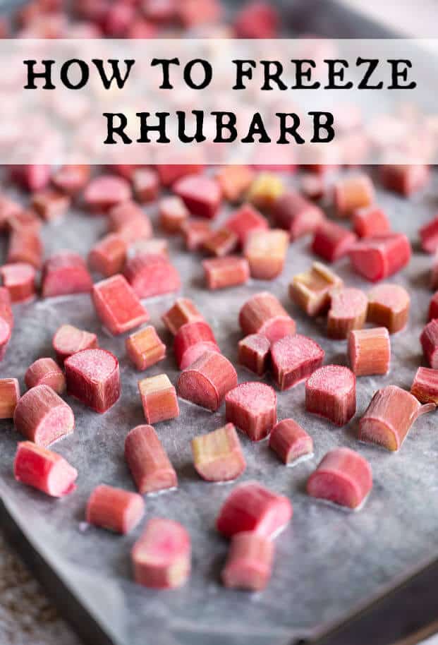 Pieces of frozen rhubarb on a wax paper lined rimmed baking sheet. via @artfrommytable