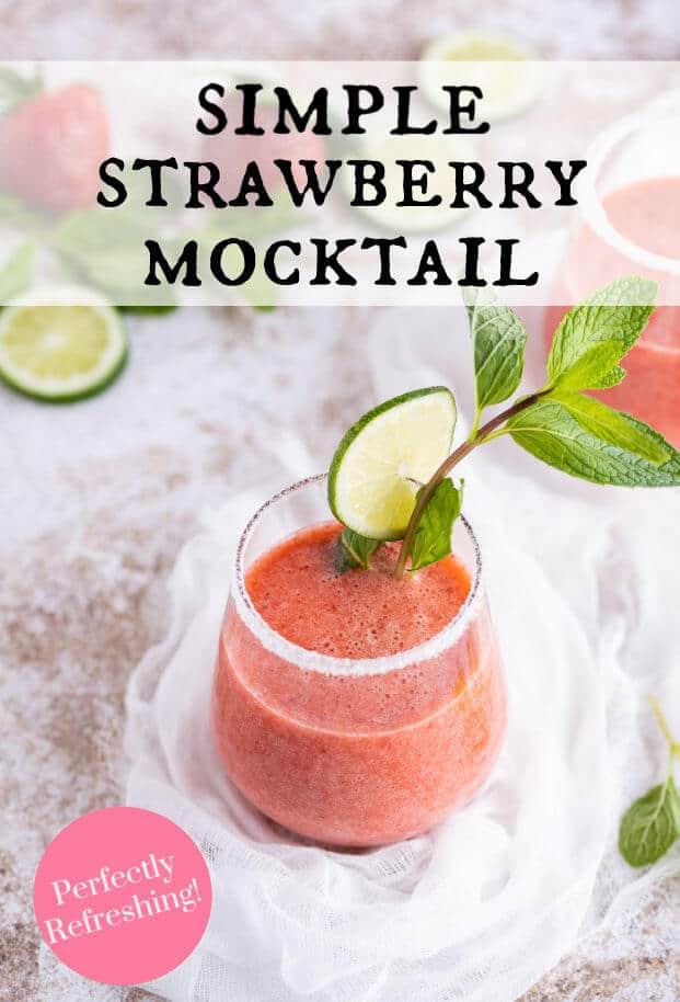 Clear sugar rimmed glass filled with a blended strawberry drink, garnished with fresh mint and a slice of lime. via @artfrommytable