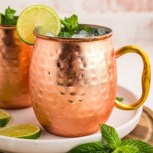 Virgin Moscow Mule in a copper mug garnished with a lime wheel and fresh mint.