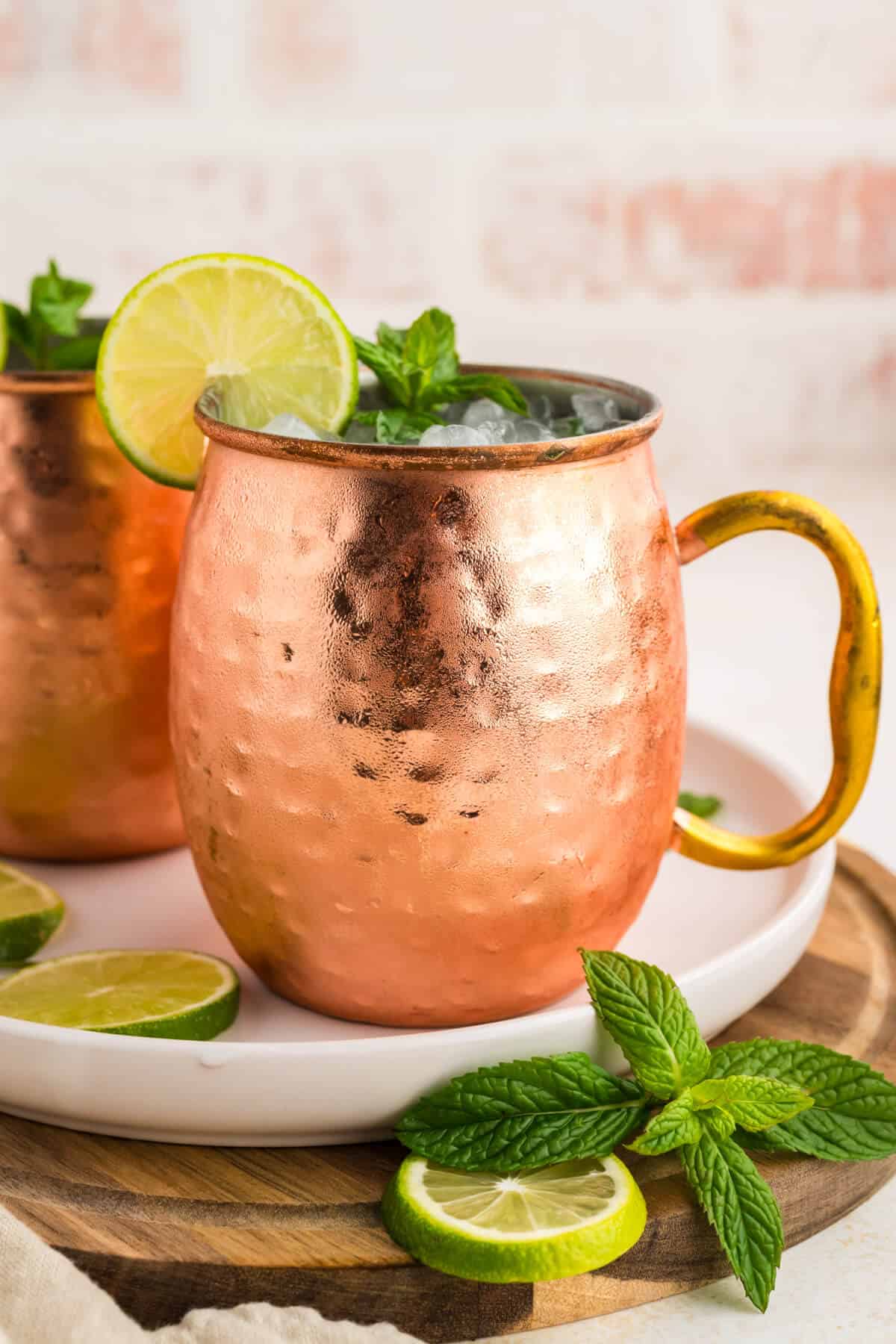 Virgin Moscow Mule in a copper mug garnished with a lime wheel and fresh mint.