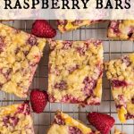 Top view of a group of raspberry crumble bars on a baking rack.