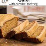 A loaf of banana bread with caramel icing, with three slices laying down on a cutting board next to the loaf itself. Text overlay reads: Sourdough Banana Bread with caramel frosting.