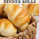 Golden homemade crescent dinner rolls in a woven basket, with text overlay that reads “Homemade Crescent Dinner Rolls.”
