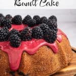 Lemon blackberry bundt cake with blackberry glaze and fresh blackberries on top, with text overlay reading “Lemon Blackberry Bundt Cake”
