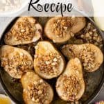 Baked pear halves topped with an oat crumble in a round baking dish, with cinnamon sticks, honey, granola, and a fresh pear around the dish. Text overlay reads: Baked Pears Recipe